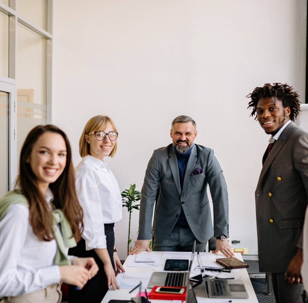 Compuwork team collaborating in a modern office providing managed IT services in USA.