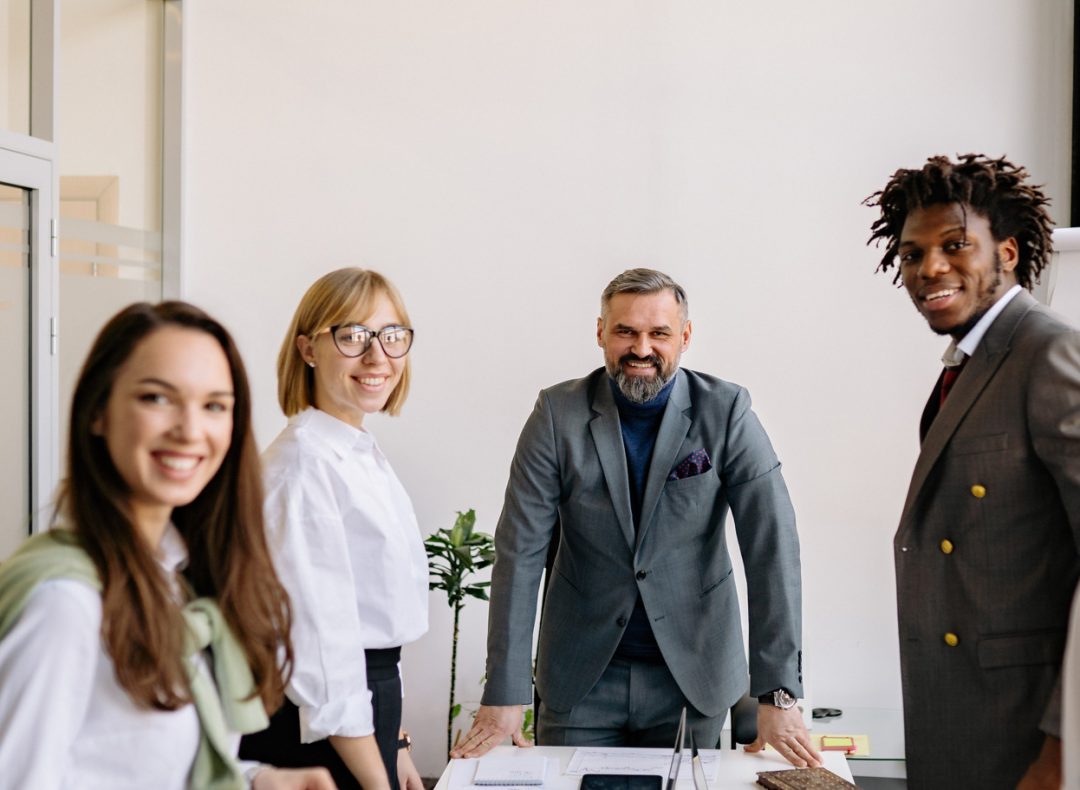 Compuwork team collaborating in a modern office providing managed IT services in USA.